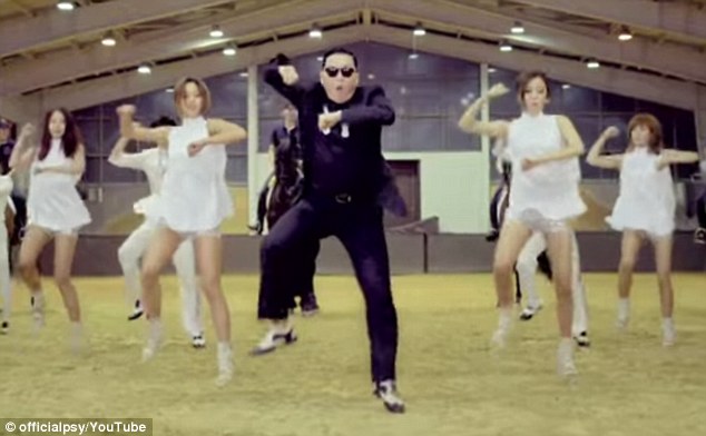 Korean pop star Psy performs Gangnam Style.