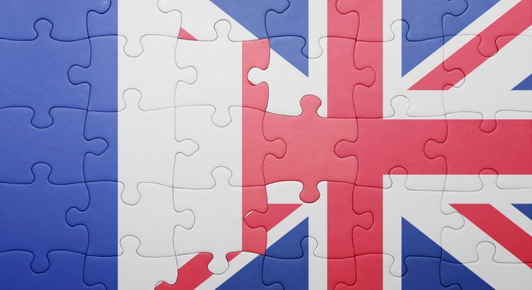 Puzzle with the national flag of great britain and france