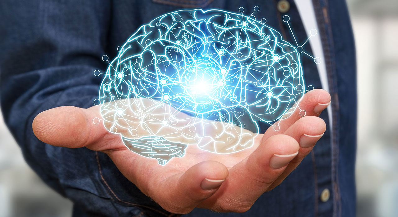 Man holding x-ray human brain in his hand