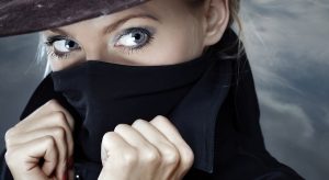 Female spy hides her mouth