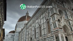 ItalianPod101 logo over the Florence Duomo cathedral in Italy