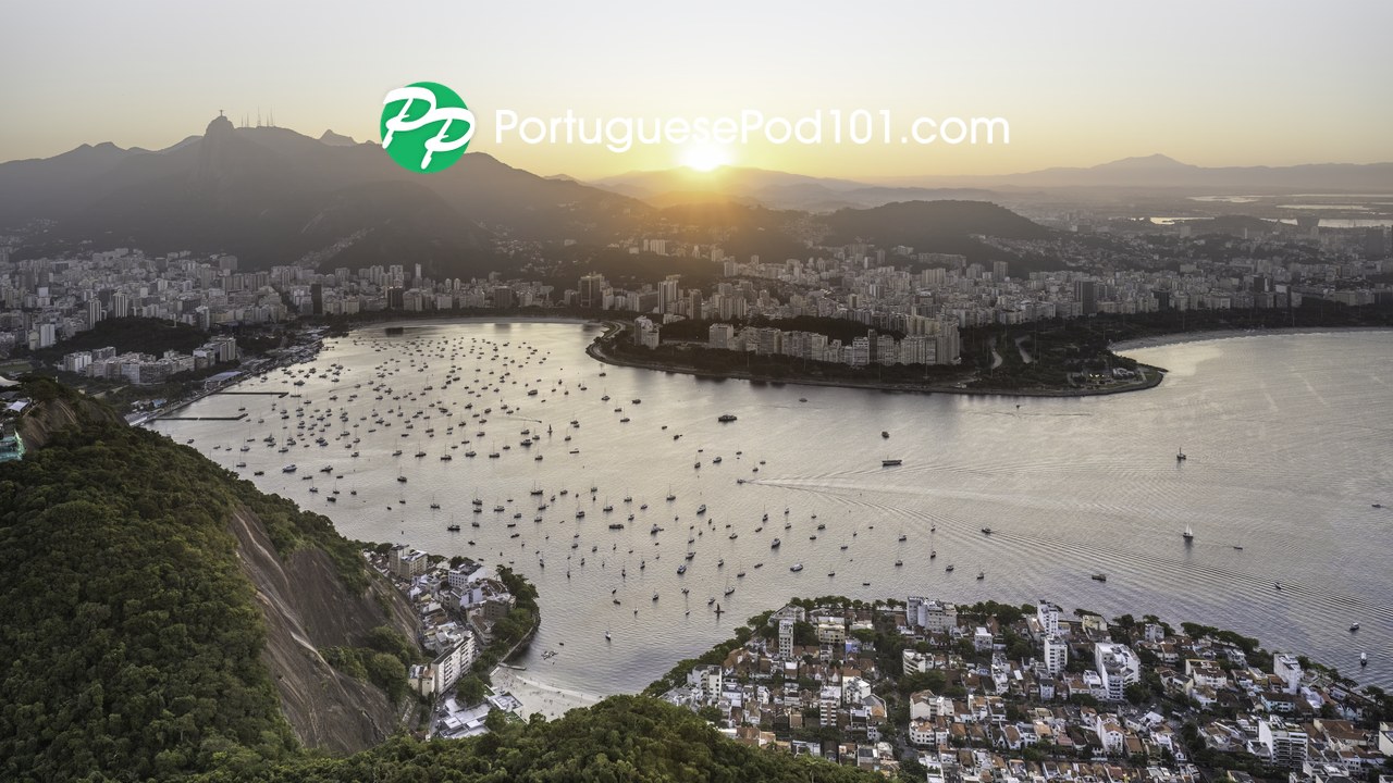 The PortuguesePod101 logo over a sunset view of Rio de Janeiro, with Christ the Redeemer and Botafogo bay