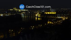 CzechClass101 logo over Prague Castle at dusk