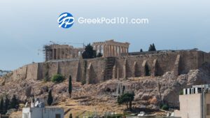 GreekPod101 logo over the Parthenon on the Acropolis in Athens