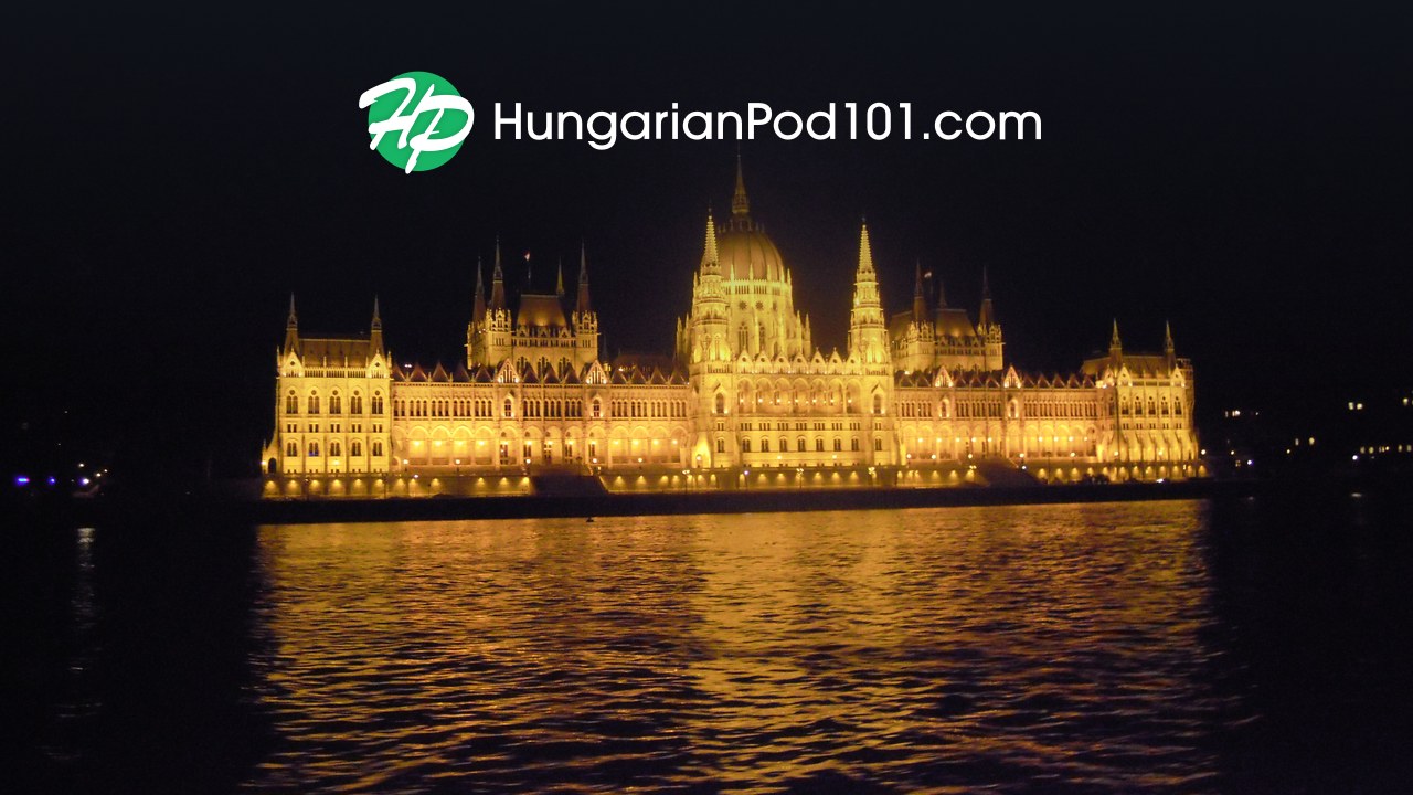 HungarianPod101 logo over the Hungarian Parliament Building beside the Danube in Budapest